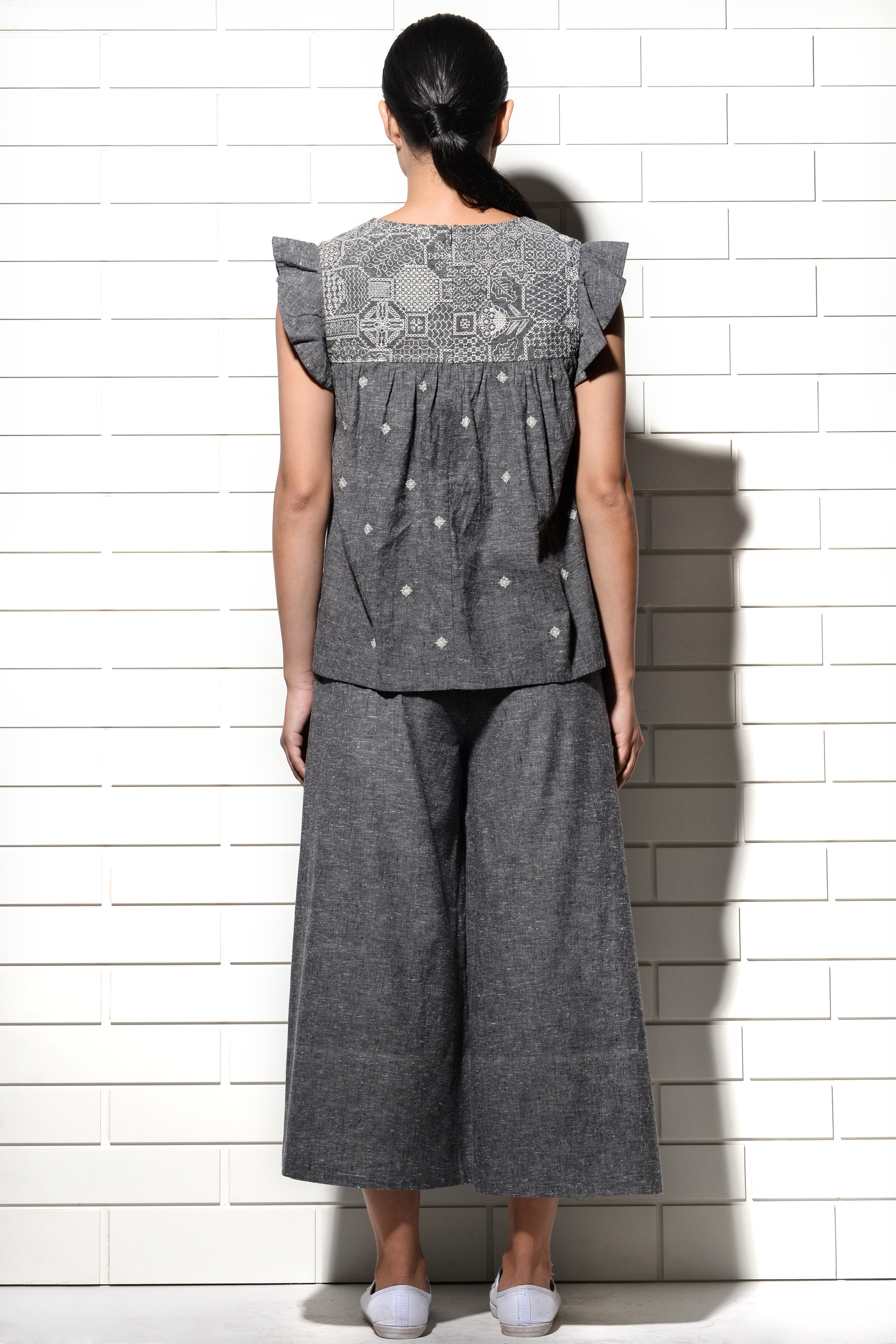 Muqarna embroidered Top with ruffled sleeves