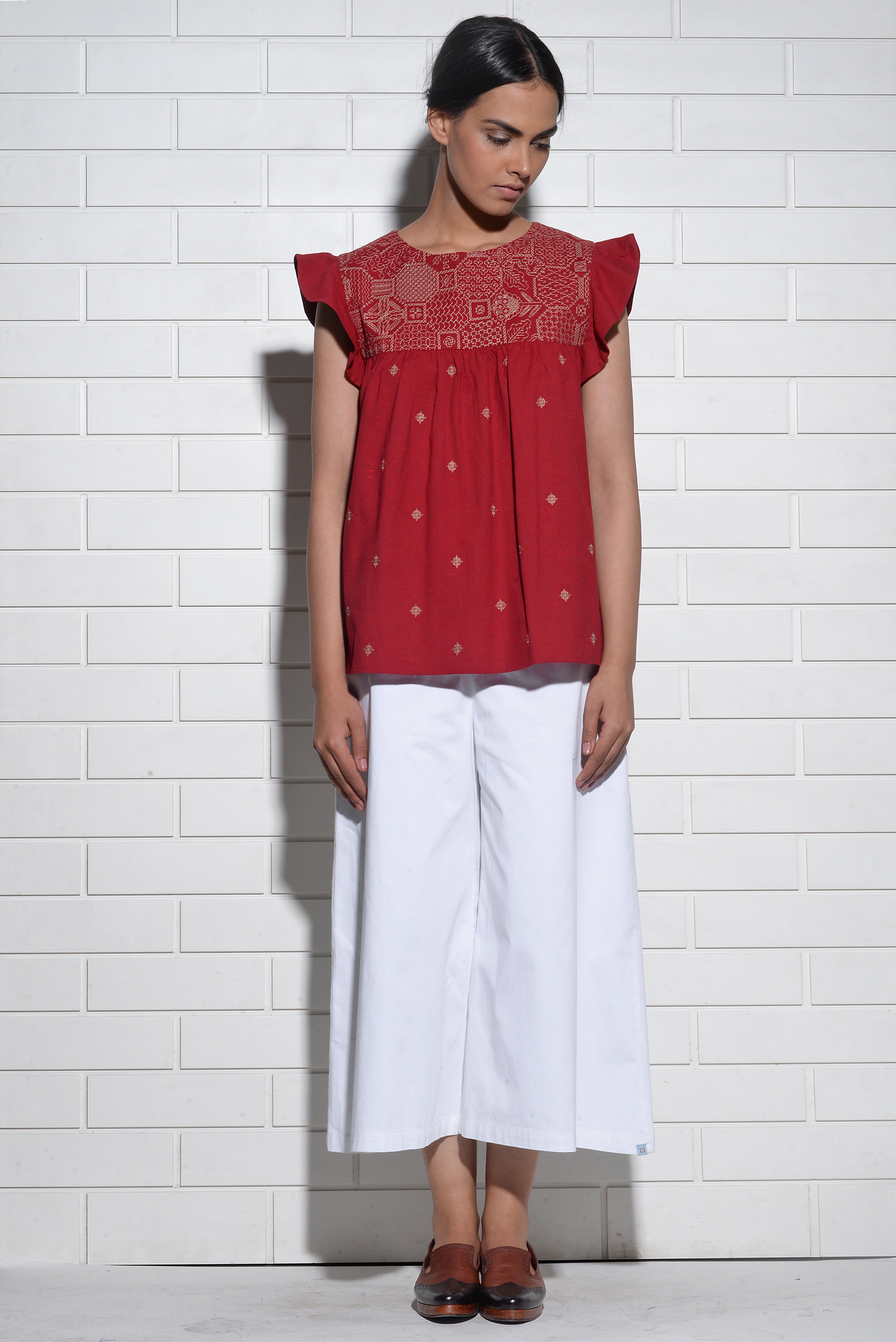 Muqarna embroidered Top with ruffled sleeves