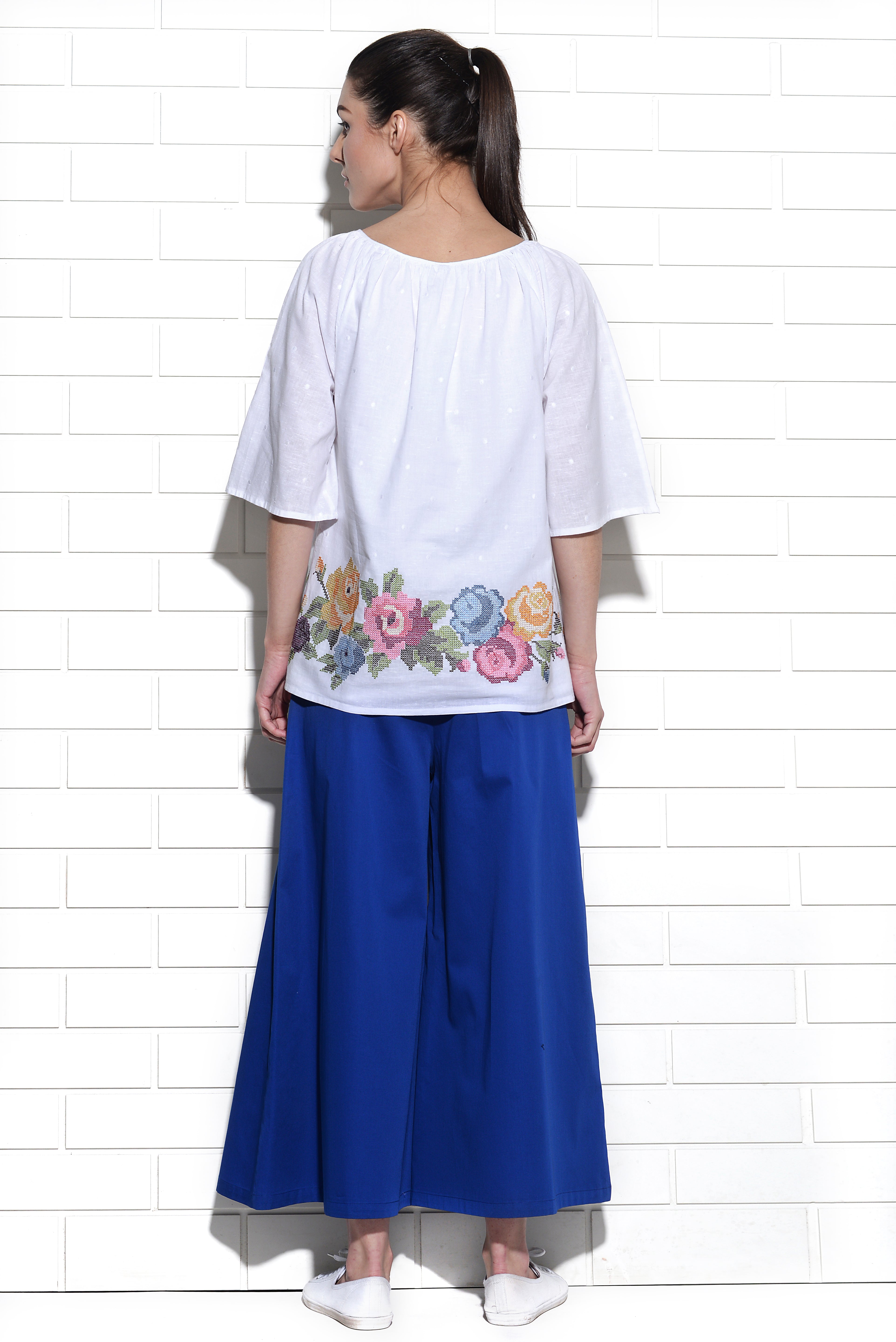 Zephyros drawstring top with rose cross stitch embroidery