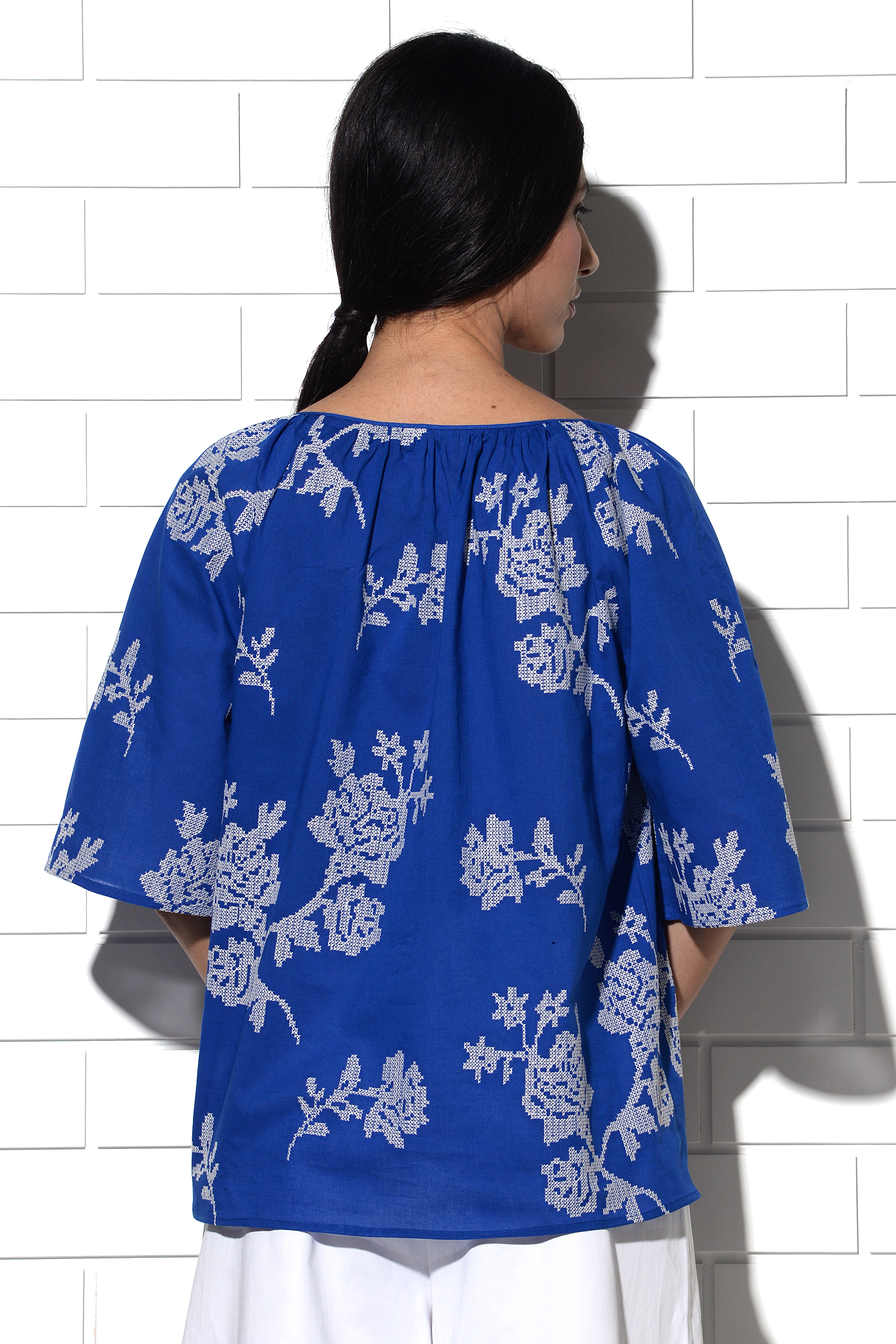 Paros gathered Top in blue with rose embroidery