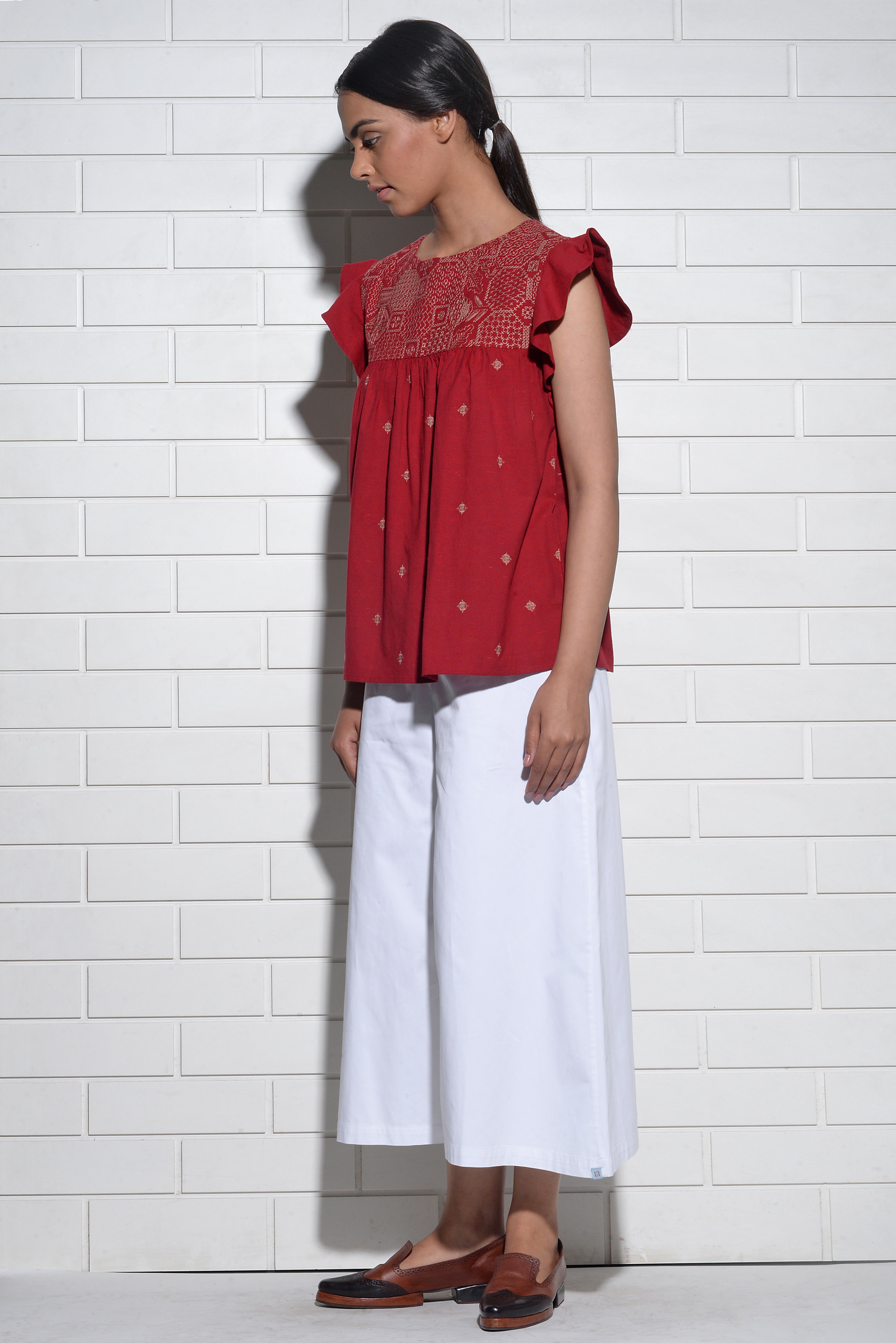 Muqarna embroidered Top with ruffled sleeves