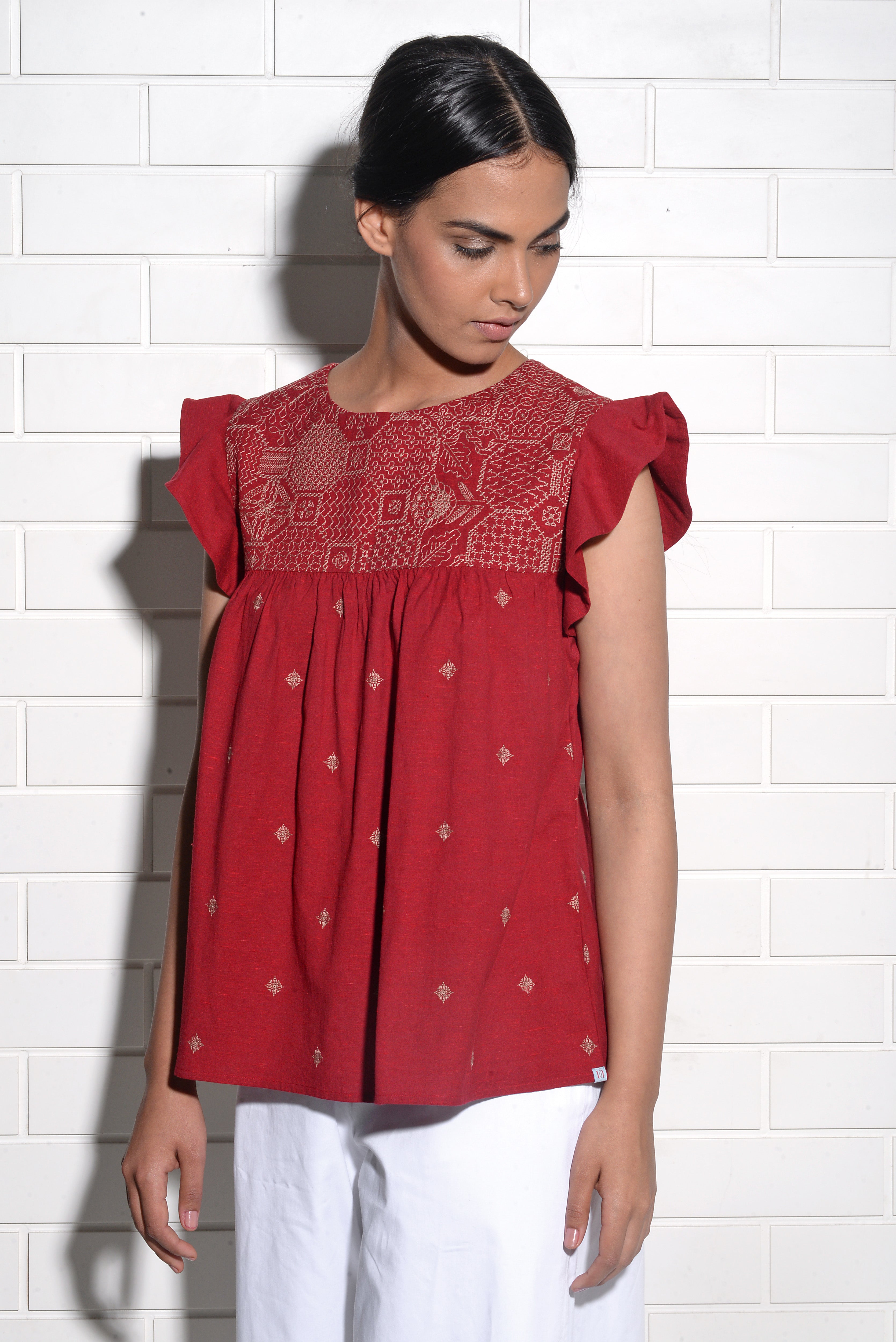 Muqarna embroidered Top with ruffled sleeves